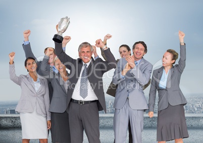 business company with trophy in front of the city