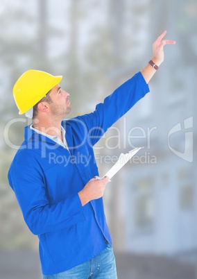 Construction Worker in front of forestry construction site