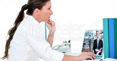 Side view of thoughtful businesswoman video conferencing through laptop in office