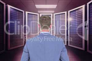 Businessman standing on in a data center