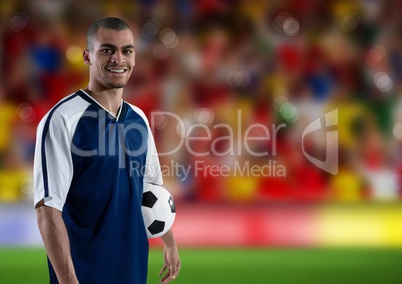 soccer player in front of the fans in the field