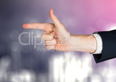 Hand pointing with sparkling light bokeh background