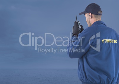 Security man outside with blue background clouds