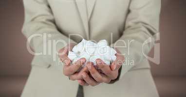 Hands holding sugar cubes