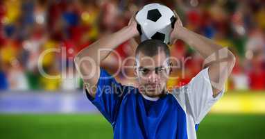 Football played ready to throw ball in goal