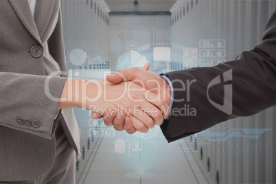 Businessman shaking their hands in a data center