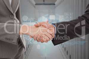 Businessman shaking their hands in a data center