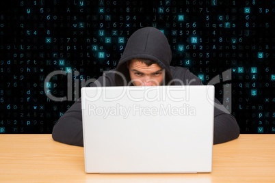 hacker behind his computer