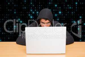 hacker behind his computer
