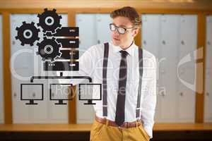 Businessman wearing glasses is drawing against server room background