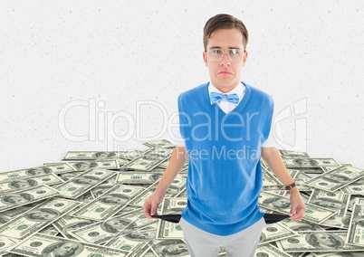 Sad young man with empty pocket on a money floor