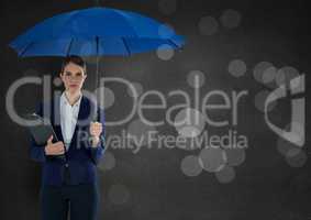 Business woman with umbrella and clipboard against grey wall and bokeh
