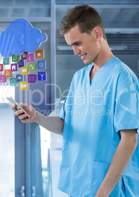 Doctor smiling at mobile phone with apps in modern room