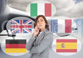 main language flags around woman in the airport