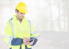 Construction Worker in front of construction site