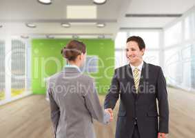 business woman and man handshake at the arrive to the office