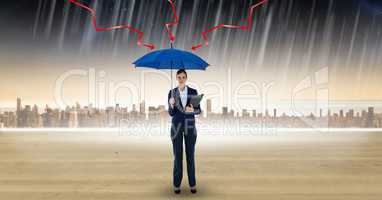 Digital composite image of lightening arrows on blue umbrella held by businesswoman standing in rain
