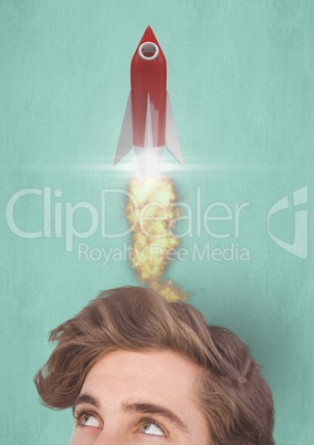 Cropped image of man having rocket launch over head