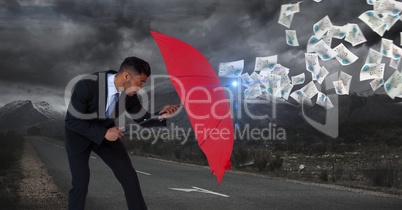 Digital image of businessman defencing documents with red umbrella while standing on road against cl