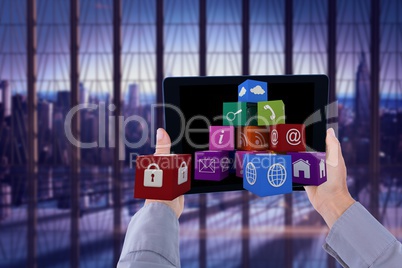 Businesswoman holding a tablet in office