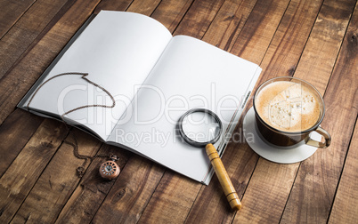 Book, magnifier, clock, coffee