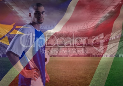 soccer player with the hands on the waist in the field,  superimpose with flag