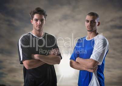 soccer players with sky background