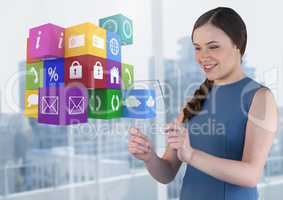 Businesswoman holding glass screen with apps icons