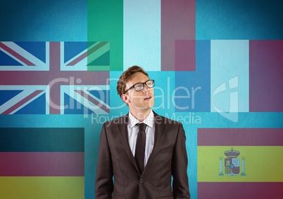 main language flags with opacity around young businessman. Blue background