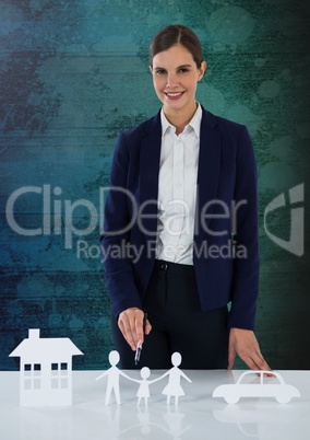 Cut outs of insurance with woman on grunge background