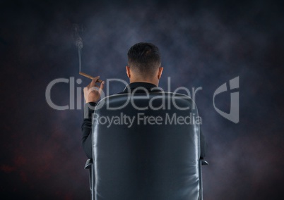 Businessman Back Sitting in Chair with cigar and dark smoky background