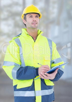 Construction Worker in front of construction site