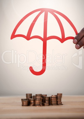 Cut out of umbrella protecting money coins
