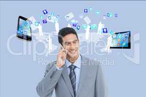 Businessman is calling against application icon, smartphone and tablet computer background