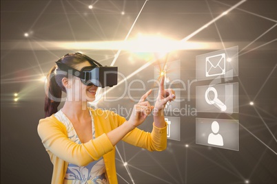 Casual woman wearing virtual glasses and showing apps on screen