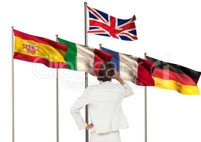 main language flags behind businesswoman backwards