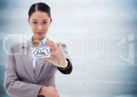Business woman holding out card showing idea doodles against blurry blue wood panel