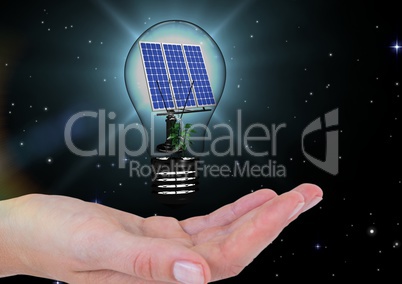 solar panel on a light on hand. night