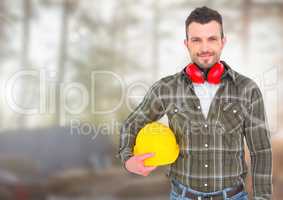 Construction Worker in front of forestry construction site