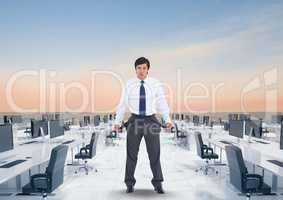 Digital image of businessman showing empty pockets while standing in office surrounded with sea agai