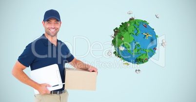 Digital image of delivery man holding box and writing pad while standing by planet earth against blu