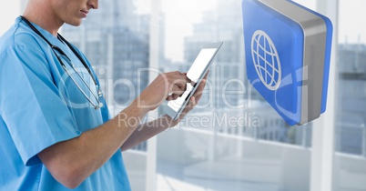 Doctor holding phone with 3D world icon by city windows