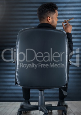 Businessman Back Sitting in Chair with cigar and blue background