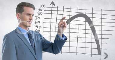 Business man pointing against grey graph and white background
