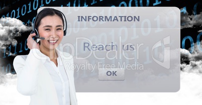 Businesswoman  with handsfree phone in front of an information chart