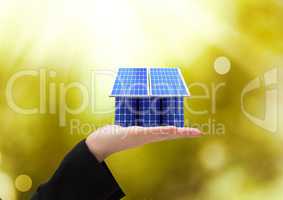 solar panel on hand. solar battery roof/ Green lights background