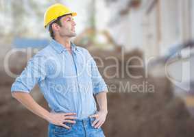 Construction Worker in front of construction site