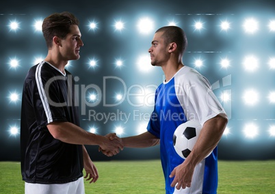 soccer players giving the hand in the field