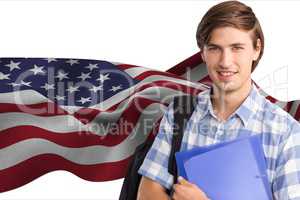 students carrying bag and holding folder against american flag background