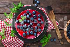 Blueberry cake with fresh berries and marmalade, cheesecake